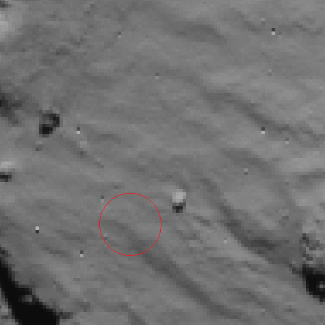 Three handout photos released on November 16, 2014, by the European Space Agency shows Philae's touchdown site before and after 