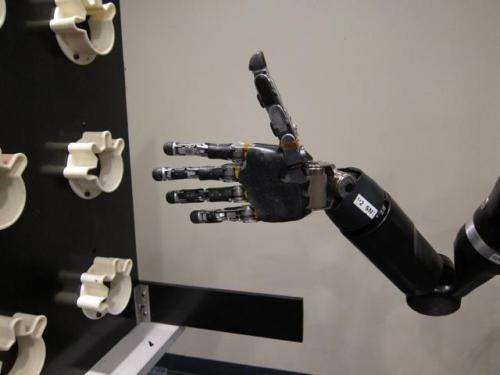Thumbs-up for mind-controlled robotic arm
