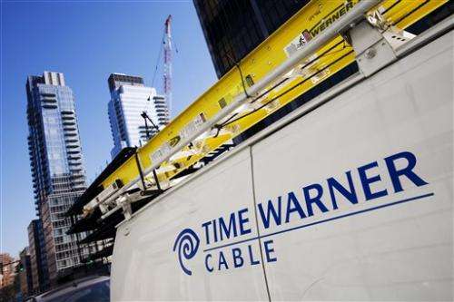 Time Warner 4Q net income falls 12 pct