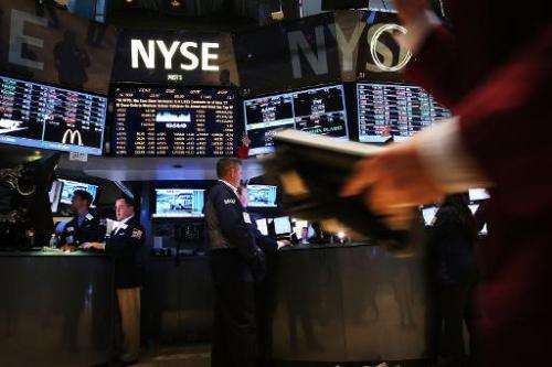 Traders work on the floor of the New York Stock Exchange on June 20, 2014 in New York City