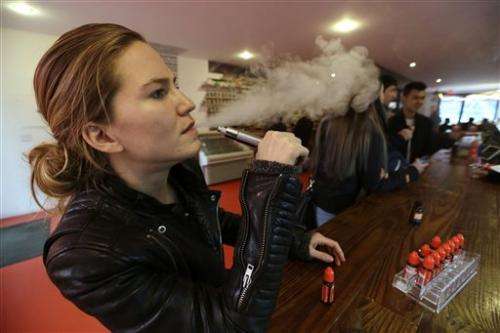 Users bemoan e-cigarette bans in NYC, Chicago