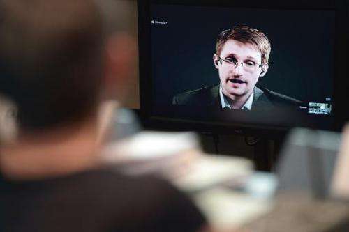 US National Security Agency whistleblower Edward Snowden speaks to European officials via videoconference, at the Council of Eur