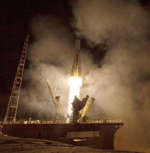 US-Russian crew docks with space station