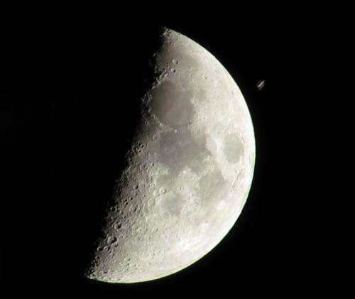 Video: Space station flies in front of the moon
