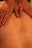 Vigorous back massage can cause spinal injury