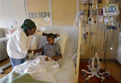 Virus probed in paralysis cases in 9 US kids