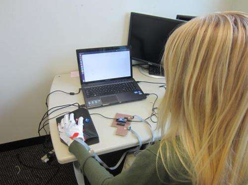 Wearable computing gloves can teach Braille, even if you're not paying attention