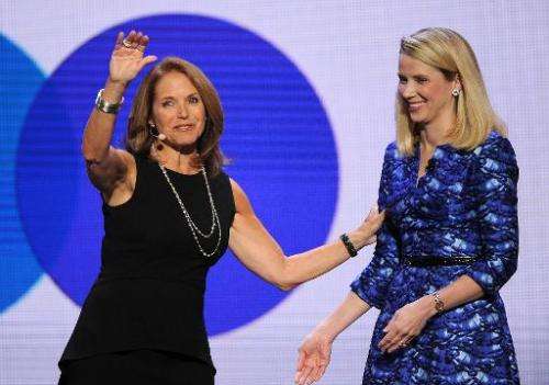 Yahoo Global Anchor Katie Couric (L) on stage with Yahoo CEO Marissa Mayer speaks during Mayer's keynote address at  the 2014 In