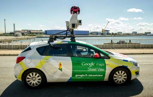 A Google Street View vehicle collects imagery for Google Maps while driving down a street in Calais, northern France, on July 29