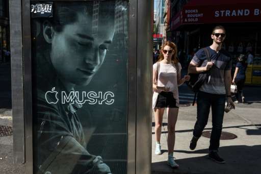 An advertisement for Apple Music is posted on the streets of Manhattan on August 7, 2015 in New York City