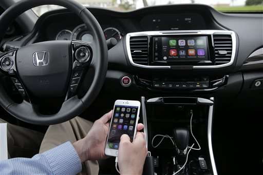 Apple, Google bring smartphone functions to car dashboards