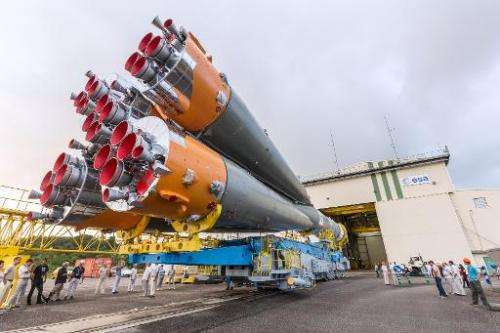 A Soyuz rocket is moved from its assembly building to its launch pad at the Guiana Space Centre in Kourou, French Guiana, on Mar