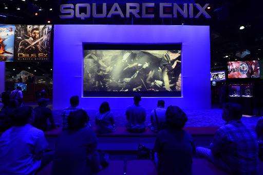 Attendees watch trailers for games from Japanese video game developer Square Enix, at the E3 Electronic Entertainment Expo in Lo