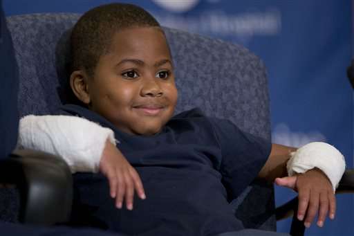 Boy who lost limbs to infection gets double-hand transplant