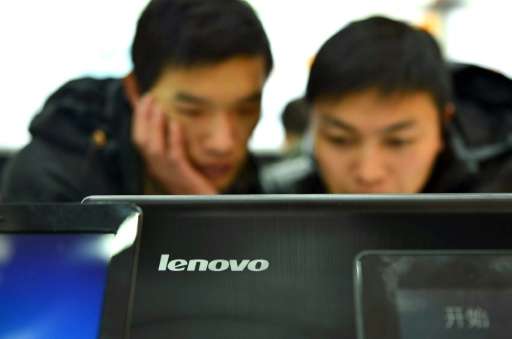Chinese technology giant Lenovo posts a smaller than expected second quarter loss as sales rise in its mobile business