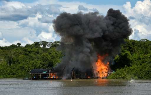 Explosives detonate at an illegal gold mine during the Anostomus II operation against illegal mining in the Puinawai National Na
