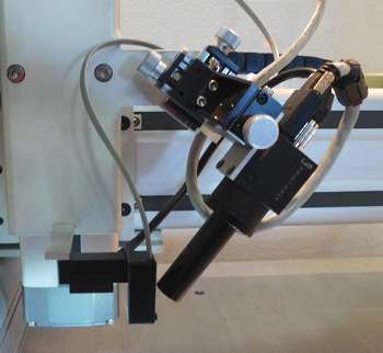 Microplotter system prints DNA, proteins, live cells, on a range of fragile materials