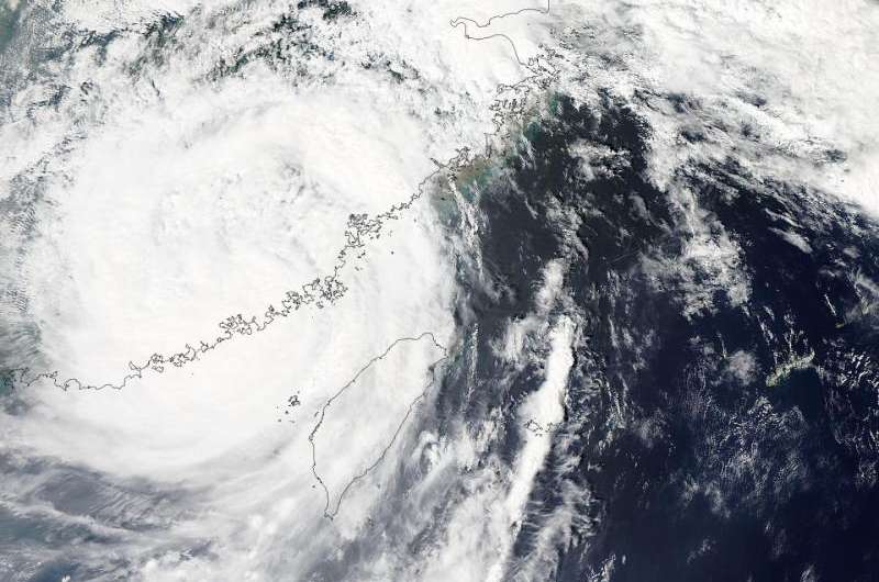 NASA captures Typhoon Dujuan's landfall in southeastern China