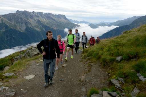 Norwegian athletes leave the Refuge du Plan de l'Aiguille in Chamonix-Mont-Blanc on July 23, 2015