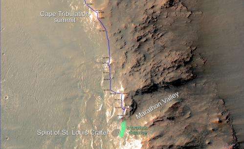Rover examining odd Mars rocks at valley overlook