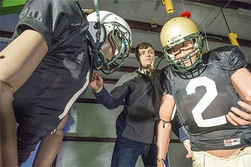 Smash-mouth football in lab points way to better helmets on the field
