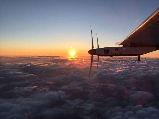 Sun rises after the Swiss-made solar-powered plane Solar Impulse 2 takes off from the international airport in Nagoya, Japan, he