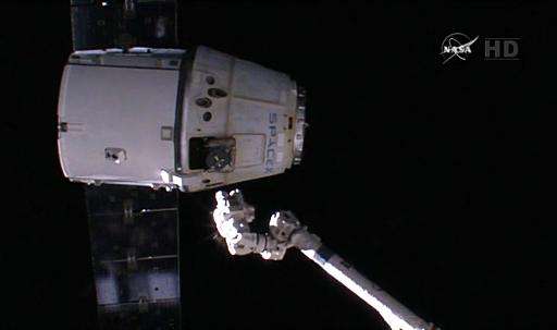 The SpaceX Dragon departs the International Space Station carrying hardware and experiments, as shown in this video grab on Febr