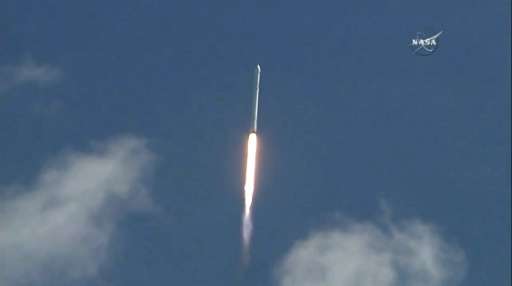 This June 28, 2015 grab from NASA TV shows the SpaceX Falcon 9 rocket with the unmanned Dragon cargo capsule on board shortly af