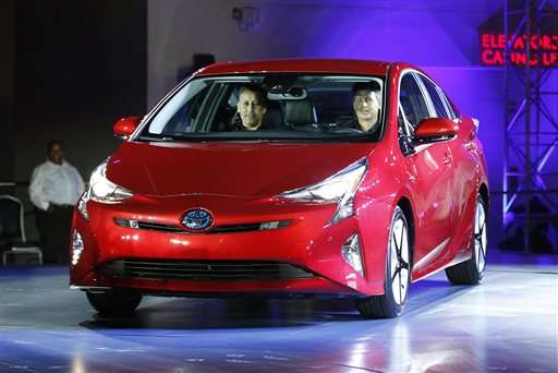 Toyota rolls out new Prius hybrid as gas prices tumble