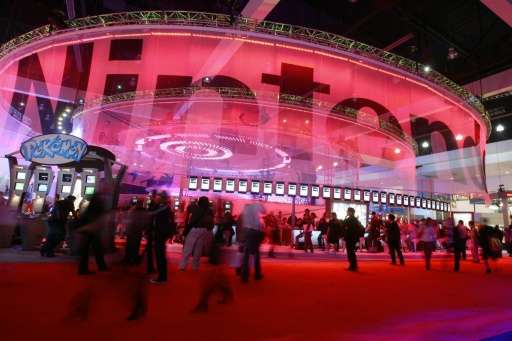 Visitors check out Nintendo products during an electronic entertainment expo in Los Angeles