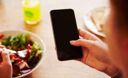 Why you should think twice about reaching for your phone at lunch