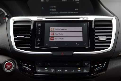 Apple, Google bring smartphone functions to car dashboards
