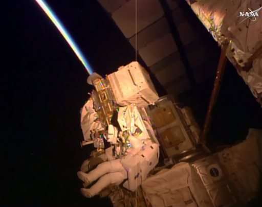 Astronaut takes spacewalk right before setting US record