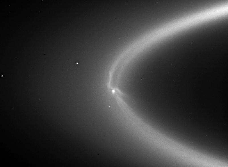 Icy tendrils reaching into Saturn ring traced to their source