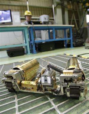 Japan readies first robot to probe melted Fukushima reactor