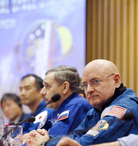 NASA astronaut Scott Kelly (R) at a press conference on December 18, 2014 at the UNESCO in Paris