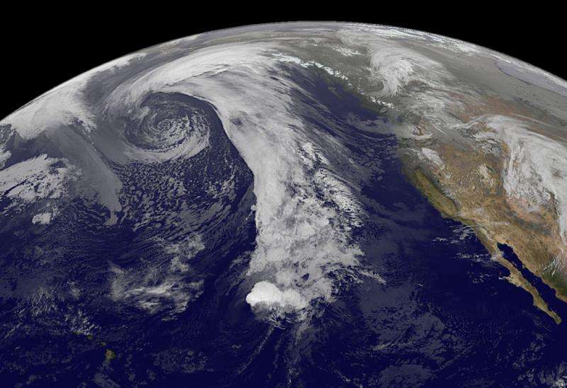 NASA sees remnants of Tropical Cyclone Champi warming and raining on Alaska