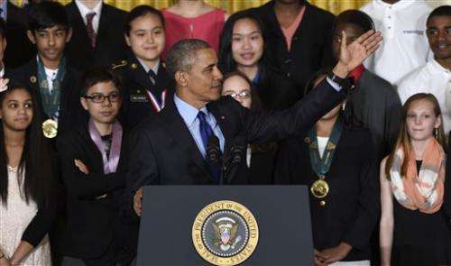 Obama, wowed by young scientists, announces new STEM pledges