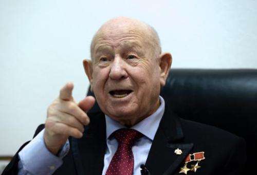Soviet cosmonaut Alexei Leonov, who was the first man to walk in space on March 18, 1965, gestures during his interview with AFP