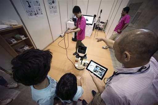 Toyota robot can pick up after people, help the sick