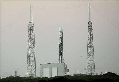 SpaceX launch of observatory, landing test off until Tuesday