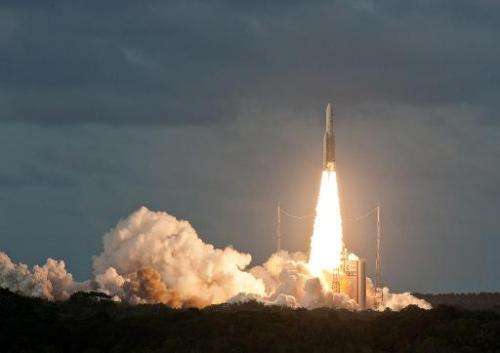 A handout photo taken and released on December 6, 2014 shows the Ariane 5 rocket being launched in Kourou, French Guiana