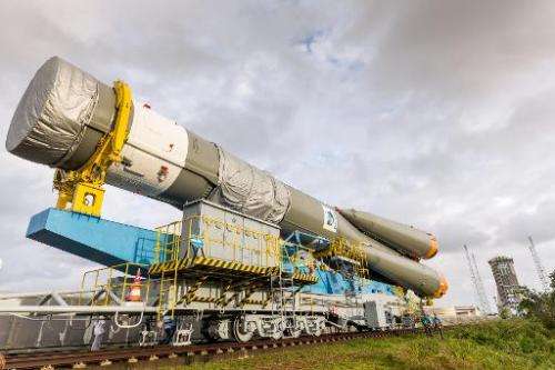 A Soyuz rocket is moved from its assembly building to its launch pad at the Guiana Space Centre in Kourou, French Guiana, on Mar