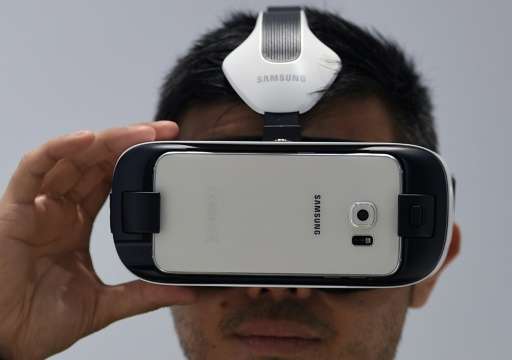 A visitor tests a Samsung Gear VR during the Mobile World Congress in Barcelona on March 2, 2015