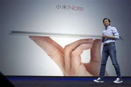 China's Xiaomi unveils phone aimed at iPhone users (Update)