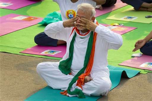 Millions across India, world bend and twist in 1st Yoga Day