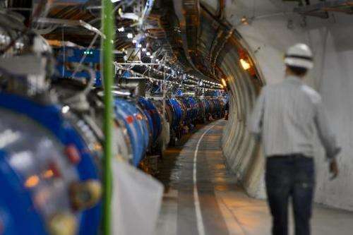 The Large Hadron Collider comprises a ring-shaped tunnel straddling the Franco-Swiss border, in which two beams of protons are s