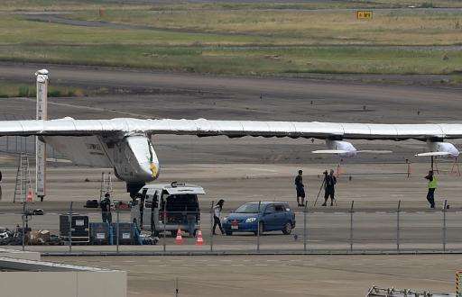 The Solar Impulse 2 is parked on the runway at Nagoya's airport on June 2, 2015