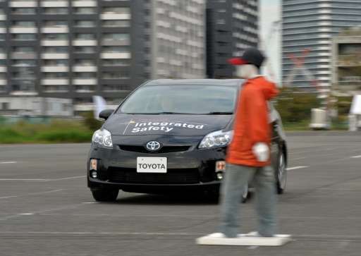 This photo taken on October 10, 2013 shows Japanese auto giant Toyota Motor demonstrating its &quot;pre-collision system&quot; w