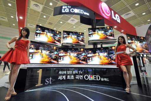 World's first curved OLED TV of LG Electronics are seen displayed during an IT show in Seoul in 2013
